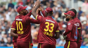 West Indies cricket team celebrating their record 254/6 total against Zimbabwe at ICC Men's T20 World Cup 2026 Wankhede Stadium Mumbai](West-Indies-T20-World-Cup-2026-record-total-Zimbabwe